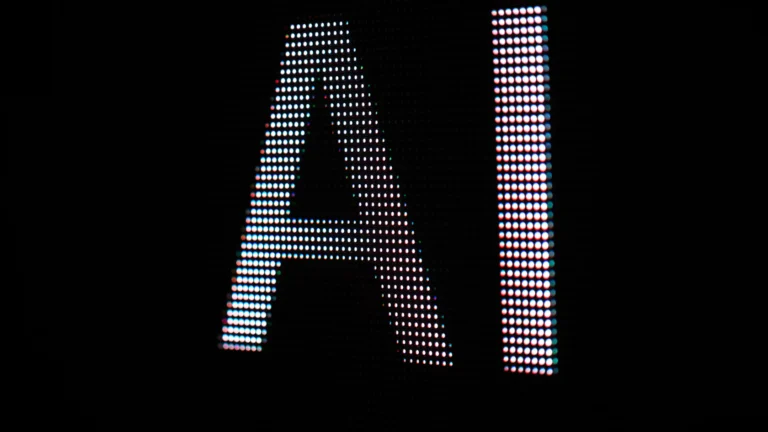 The letter ai is displayed on a black screen.